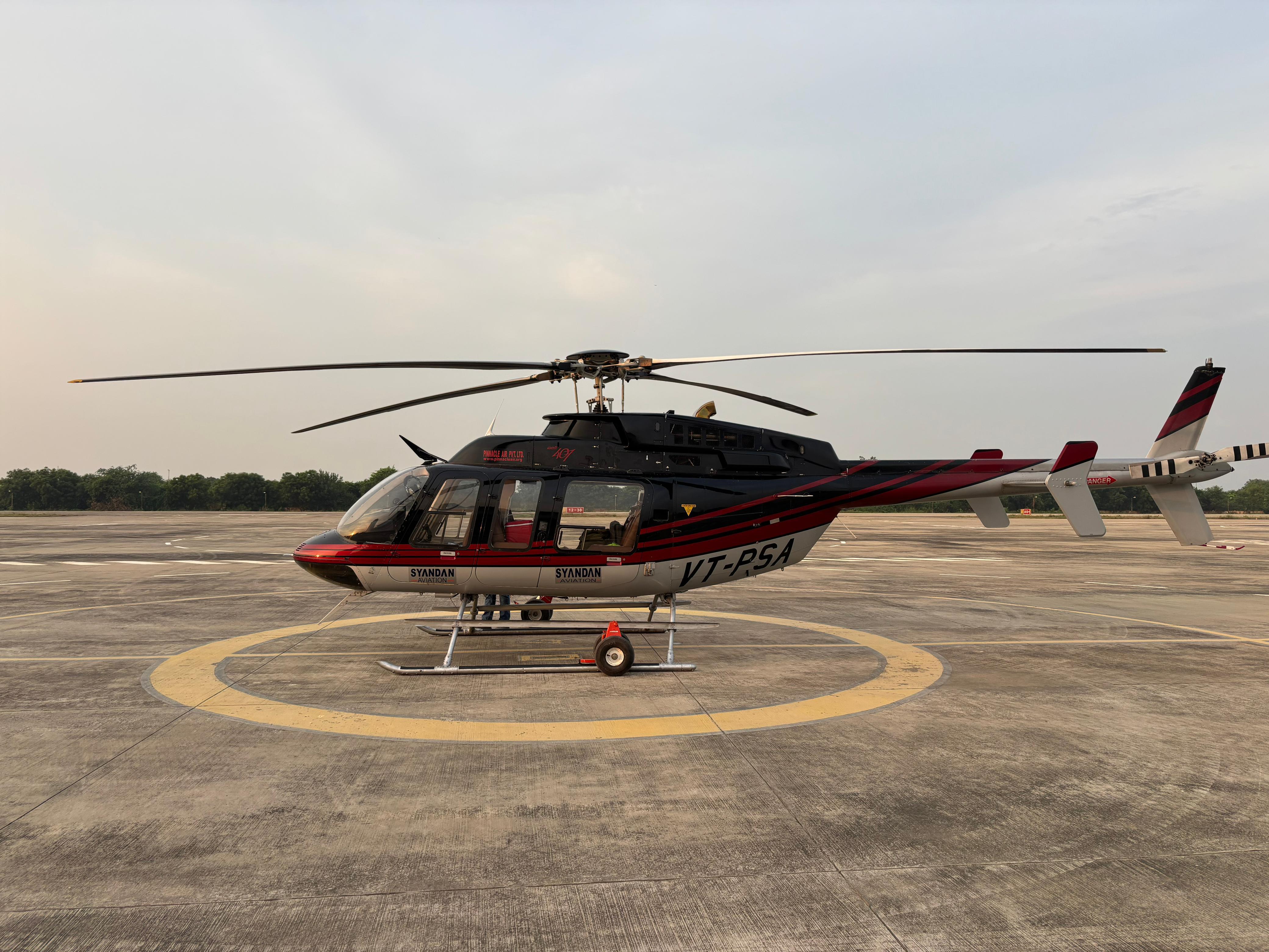 Helicopter flying over mountains